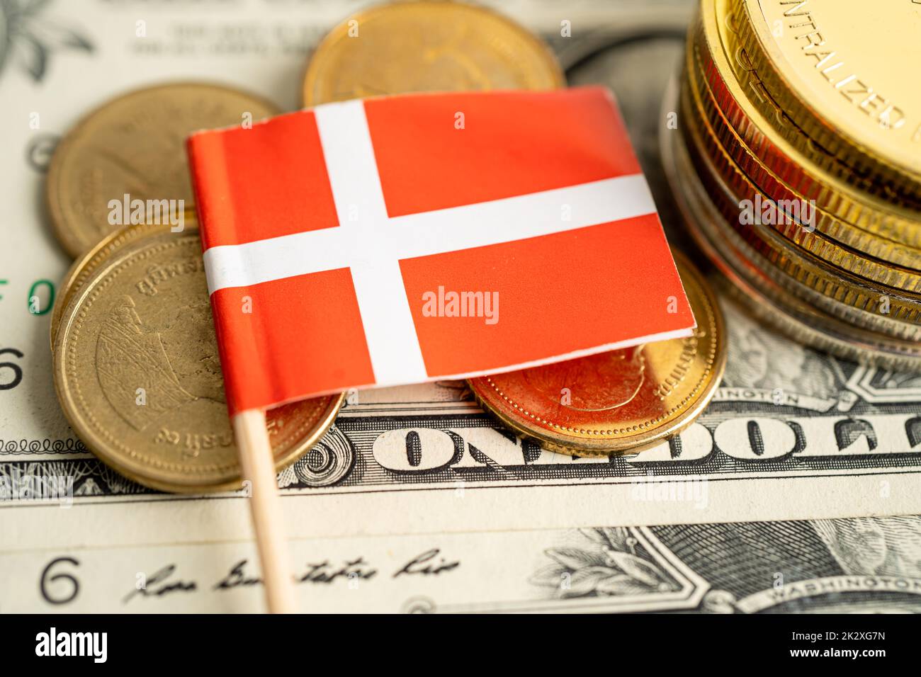 Stack of coins money with Denmark flag, finance banking concept. Stock Photo