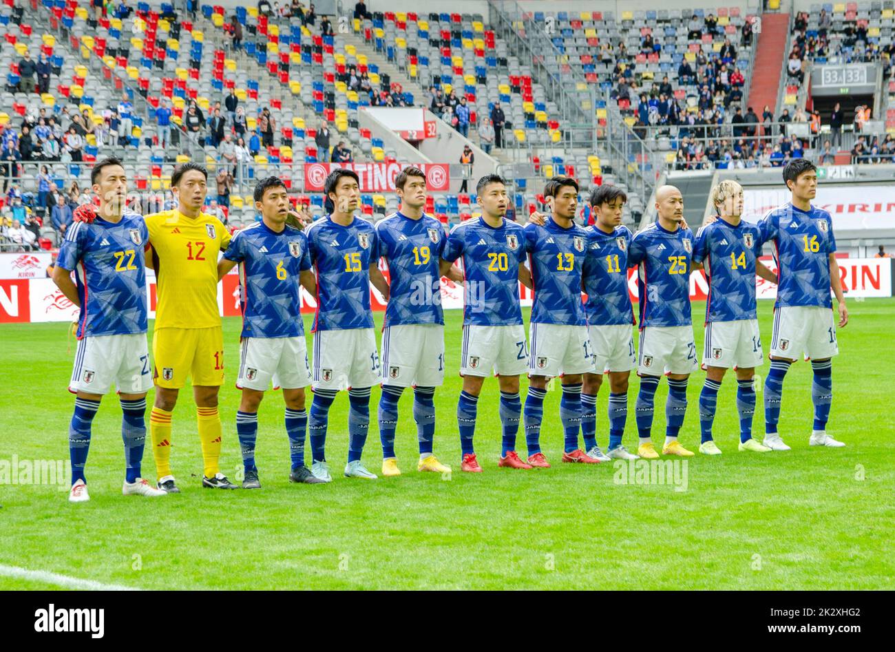 Dusseldorf, North Rhine Westphalia, Germany. 23rd Sep, 2022. The Japanese national team, including (from left to right) MAYA YOSHIDA (22), SHUICHI GONDA (12), WATARU ENDO (6), DAICHI KAMADA (15), HIROKI SAKAI (19), YUTA NAKAYAMA (20), HIDEMASA MORITA (13), TAKEFUSA KUBO (11), DAIZEN MAEDA (25), jUNYA iTO (14) and tAKEHIRO TOMIYASU (16) sing the national anthem before the 2022 Kirin Challenge Cup against the United States in the Merkur Spiel Arena in Duuseldorf, Germany. (Credit Image: © Kai Dambach/ZUMA Press Wire) Credit: ZUMA Press, Inc./Alamy Live News Stock Photo