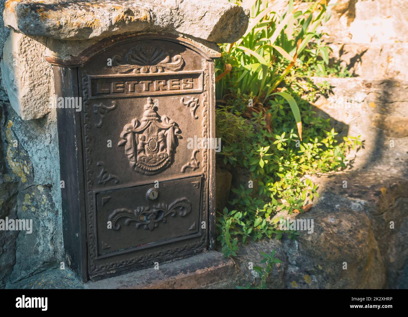 Old mailbox in an old french town. Vintage. Antic mailbox Stock Photo