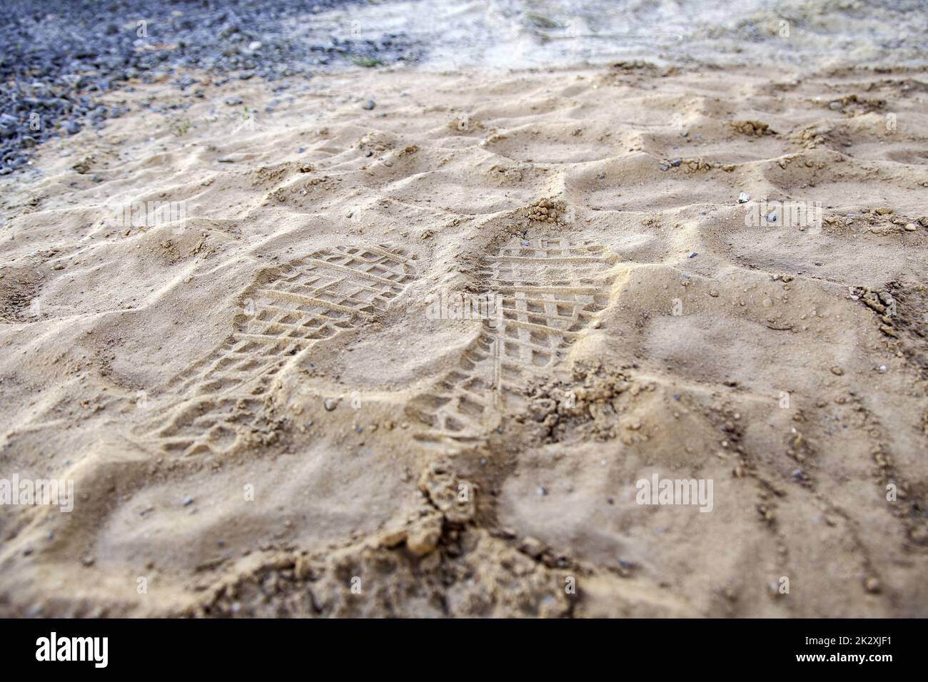 Footprints of soles in the sand Stock Photo Alamy
