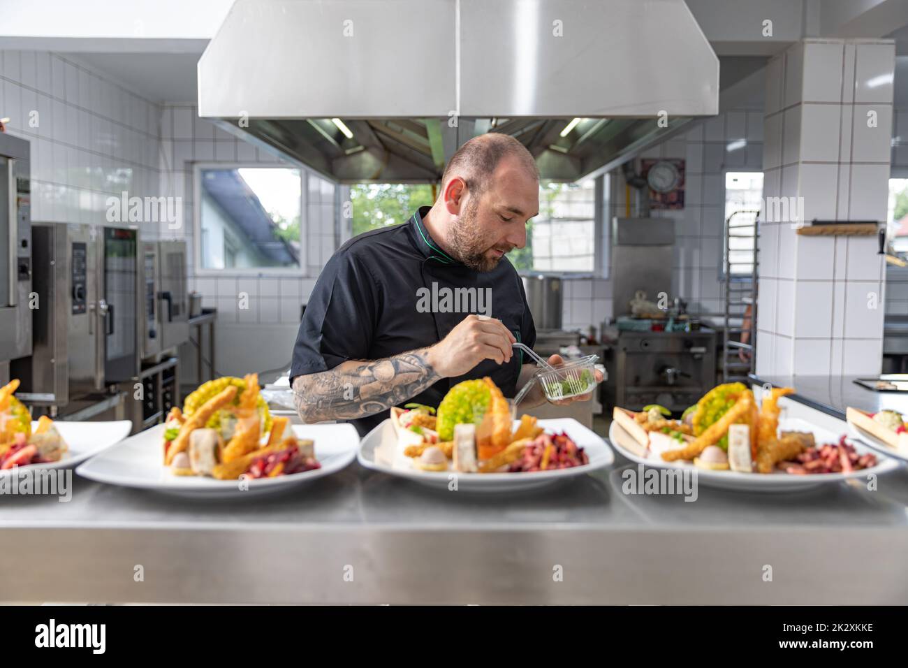 Chef is in final touch process Stock Photo