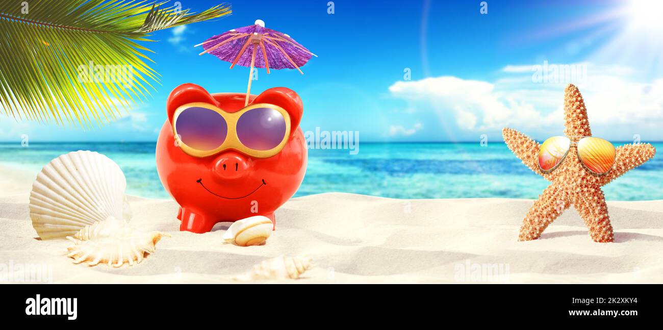 piggy bank with sunglasses on tropical beach - summer holiday Stock ...