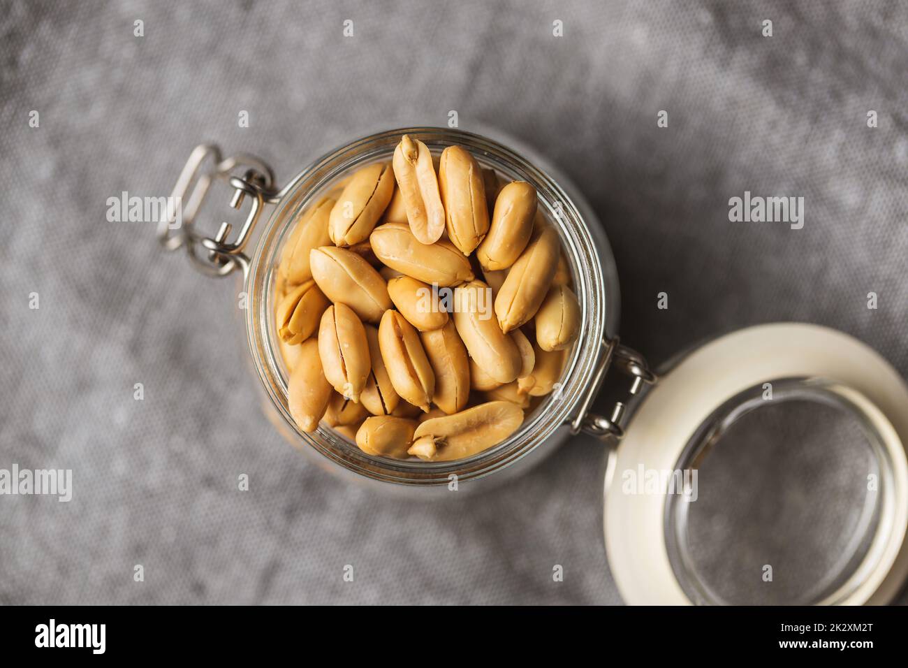 Roasted peeled peanuts in jar Stock Photo Alamy