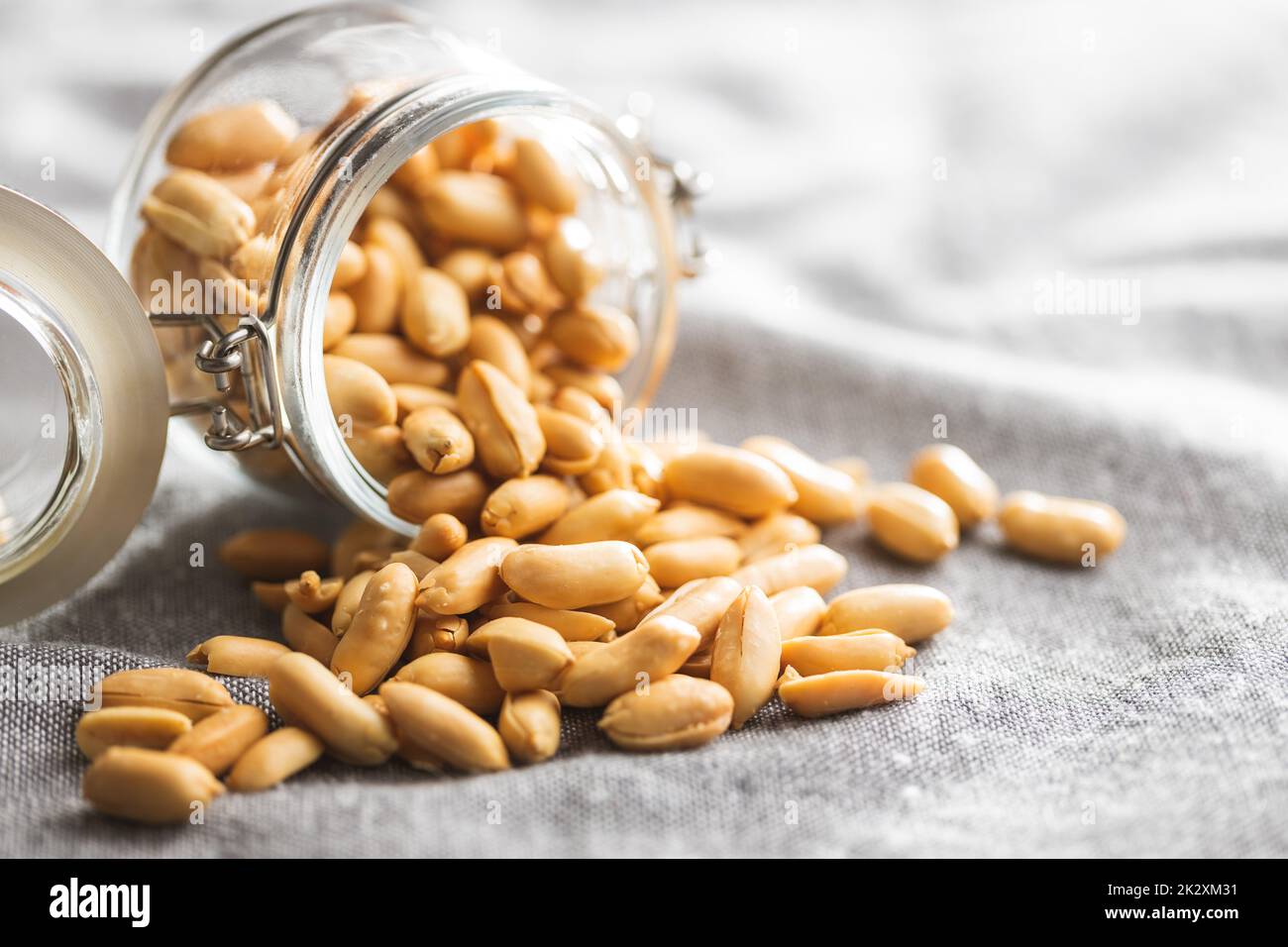 Roasted peeled peanuts in jar Stock Photo Alamy