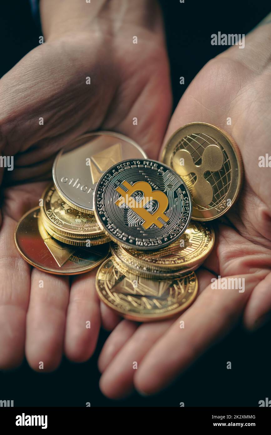Silver and gold various digital cryptocurrencies, with Bitcoin on top Stock Photo