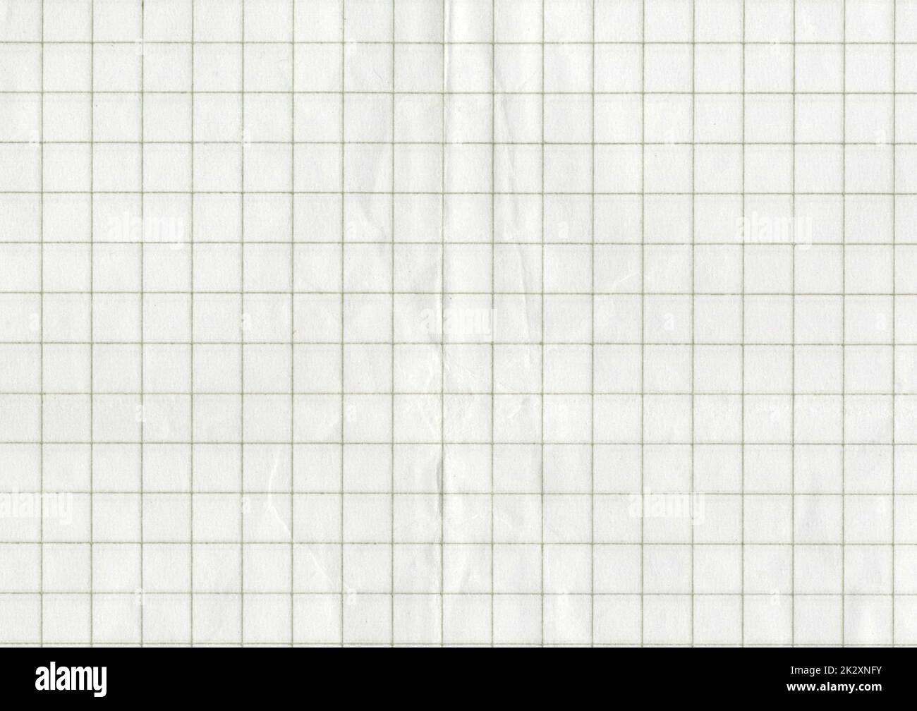 High resolution large image of a white uncoated checkered graph paper scan wrinkled weathered old thin textbook paper with gray checkers copy space for text for presentation high quality wallpaper Stock Photo