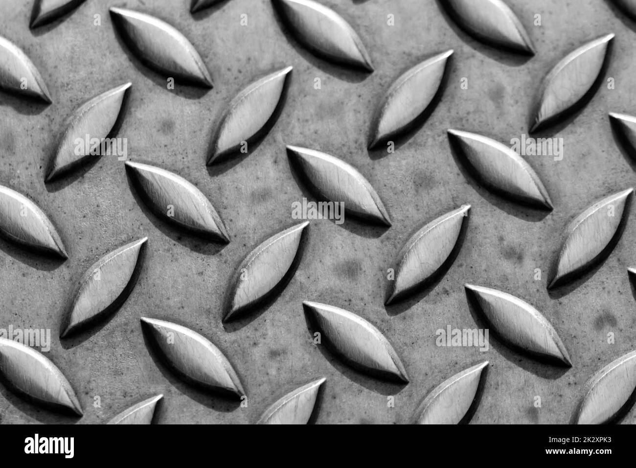 Solid diamond metal plate surface shows stainless steel flooring in