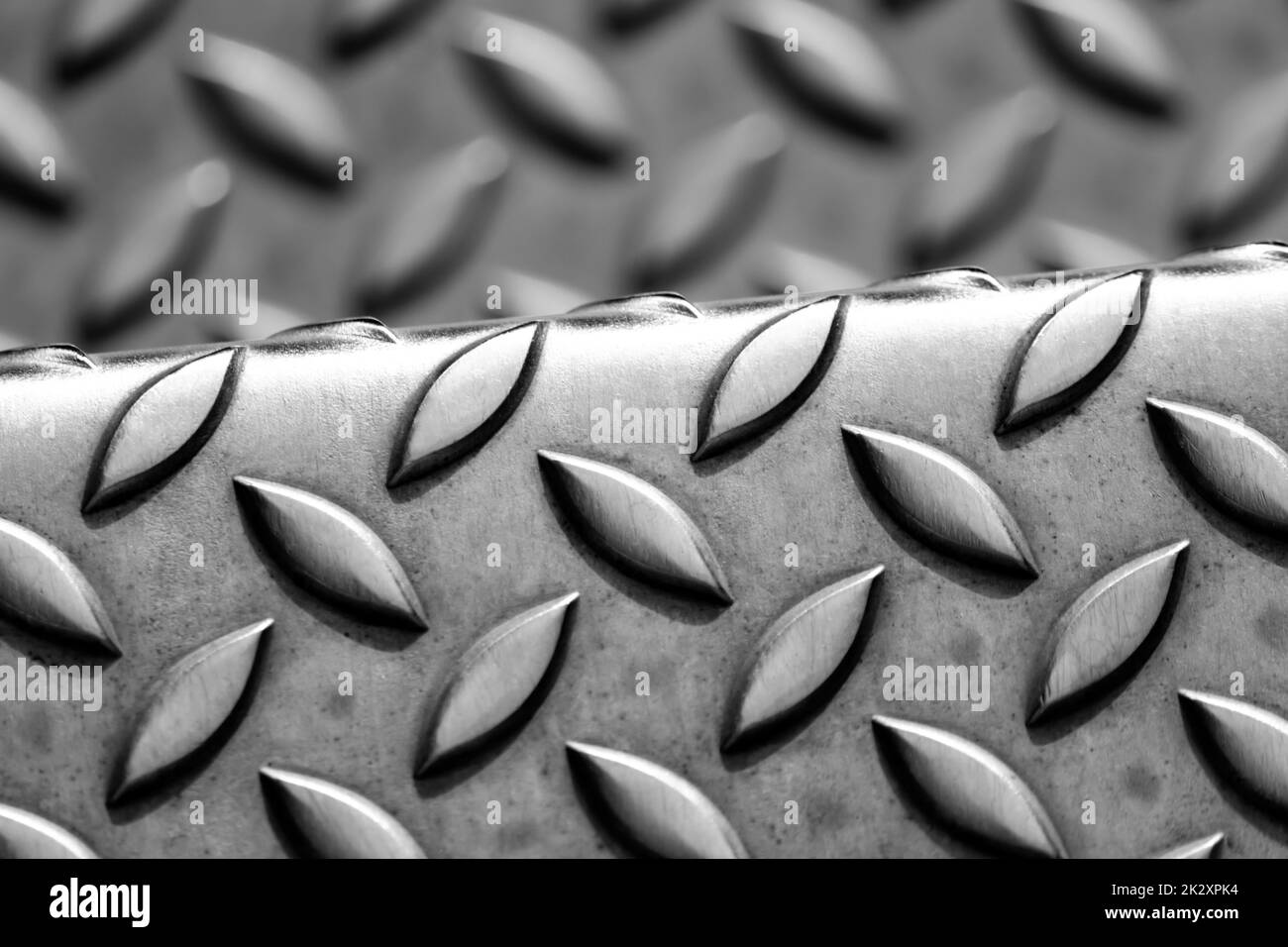 Solid diamond metal plate surface shows stainless steel flooring in