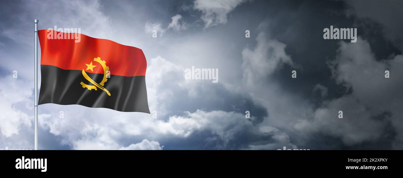 Angolan flag on a cloudy sky Stock Photo