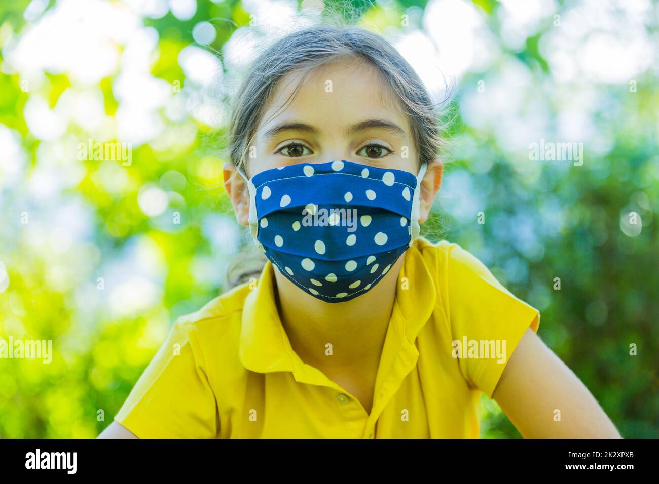 Little girl with mask Stock Photo Alamy