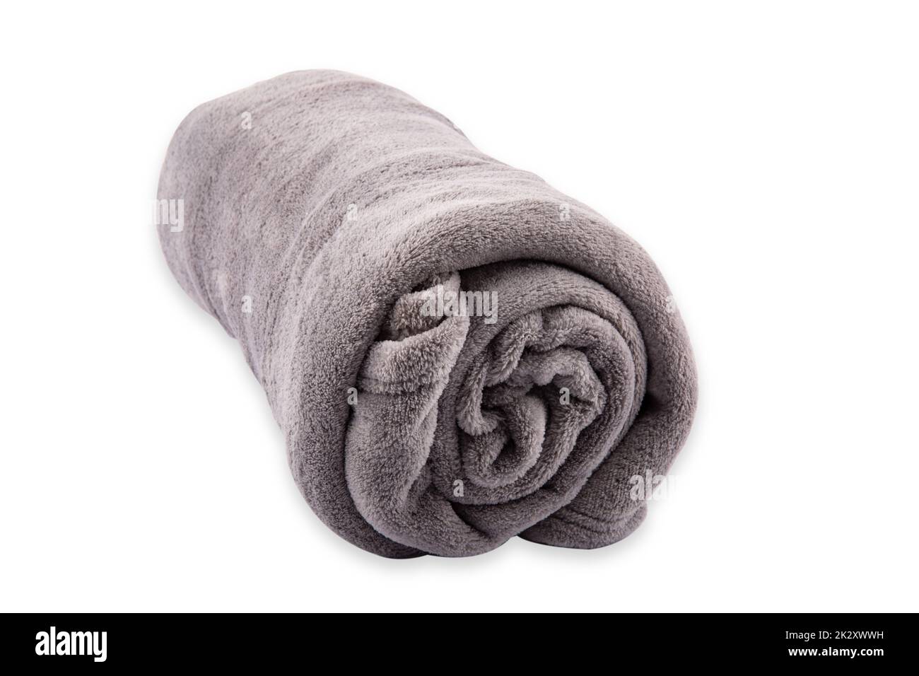 Gray rolled microfiber blanket isolated over white background Stock Photo