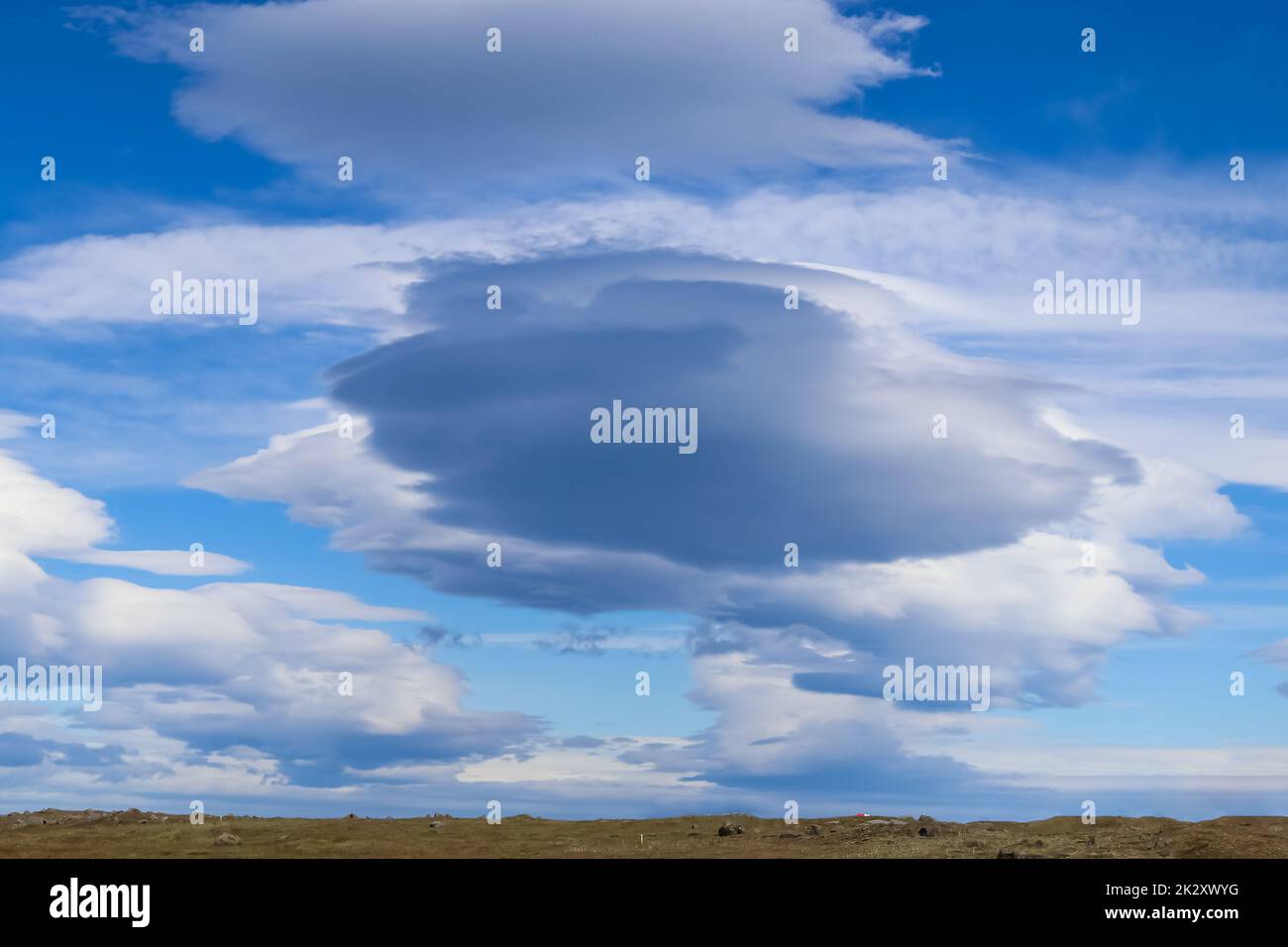 Spectacular UFO clouds in the sky over Iceland - Altocumulus Lenticularis. Stock Photo