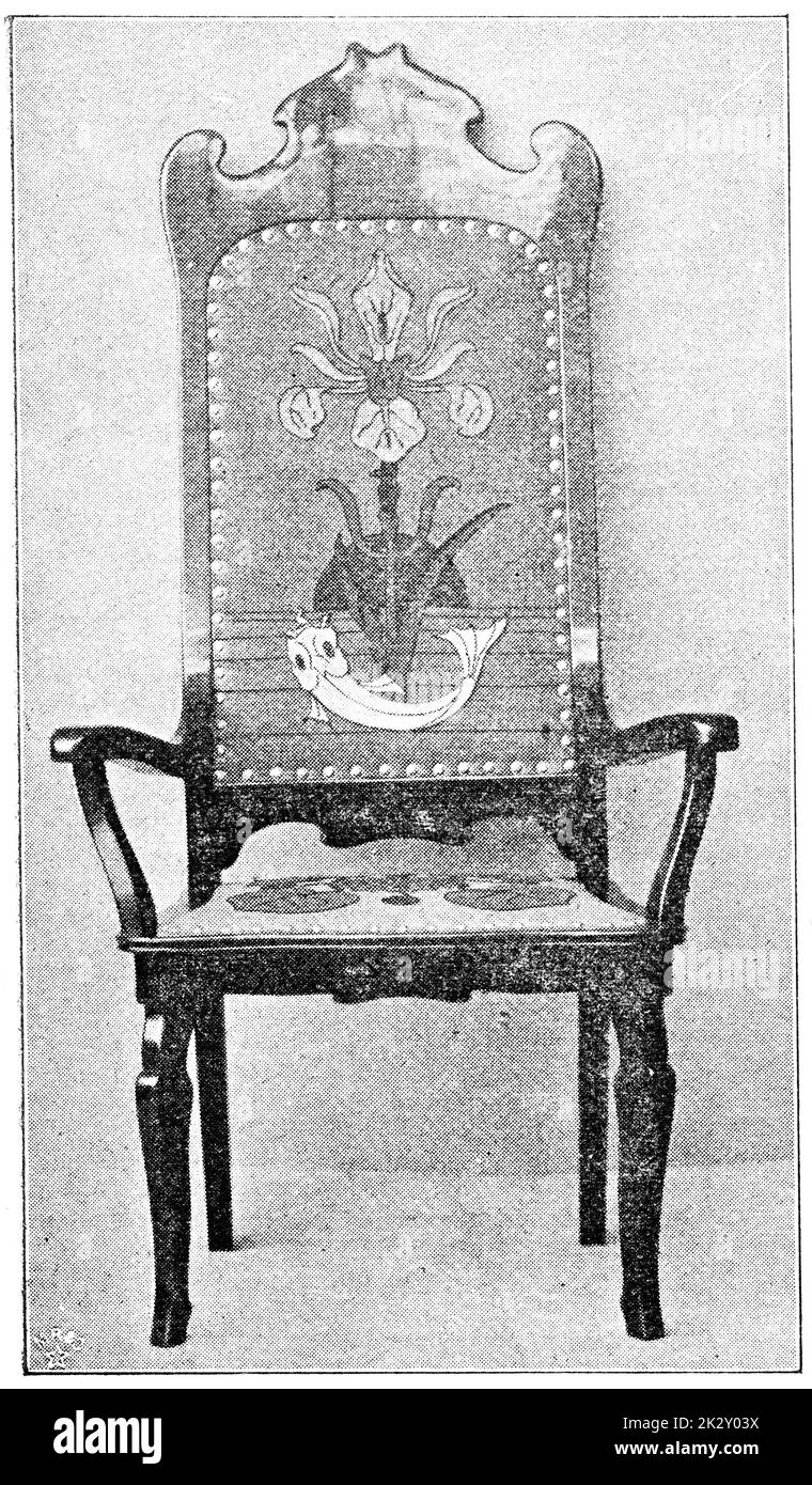 Wooden beautiful chair with a high back. Illustration of the 19th century. Germany. White background. Stock Photo