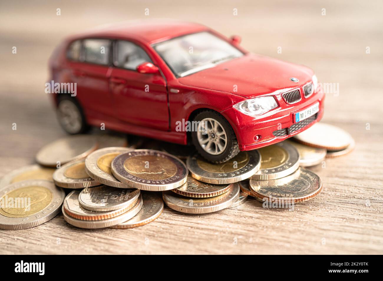 Bangkok, Thailand January 20, 2022 Car on stack of coins. Car loan