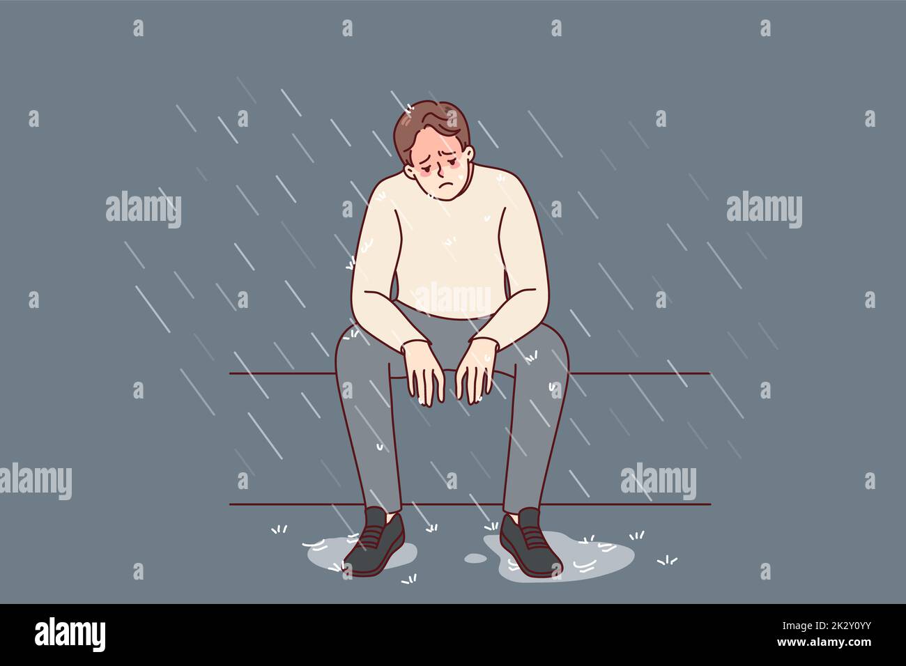 Unhappy man under rain feeling depressed Stock Photo