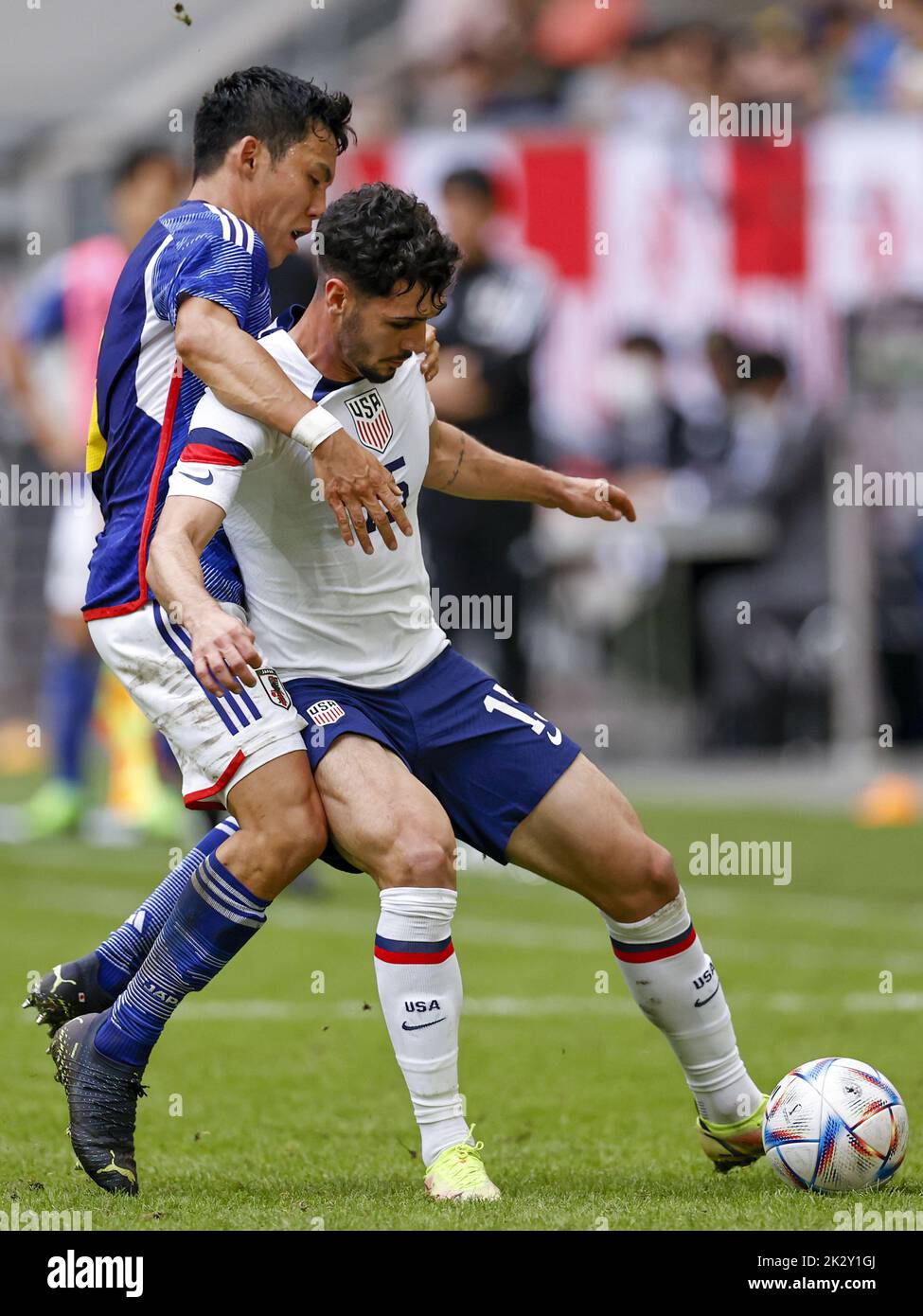 DUSSELDORF (lr) Wataru Endo of Japan, Johnny Cardoso of United States