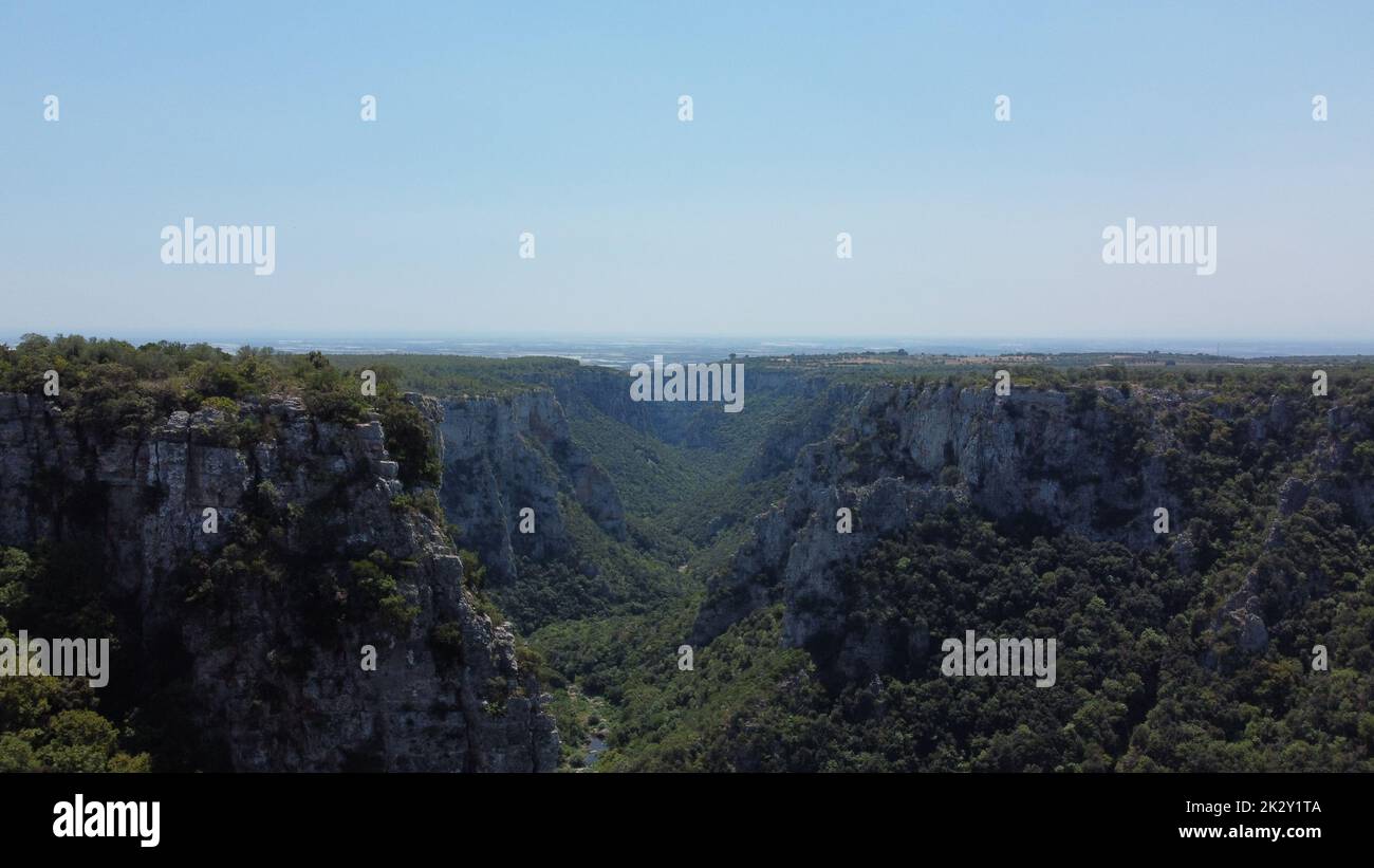 A scenic valley with lush green vegetation Stock Photo - Alamy