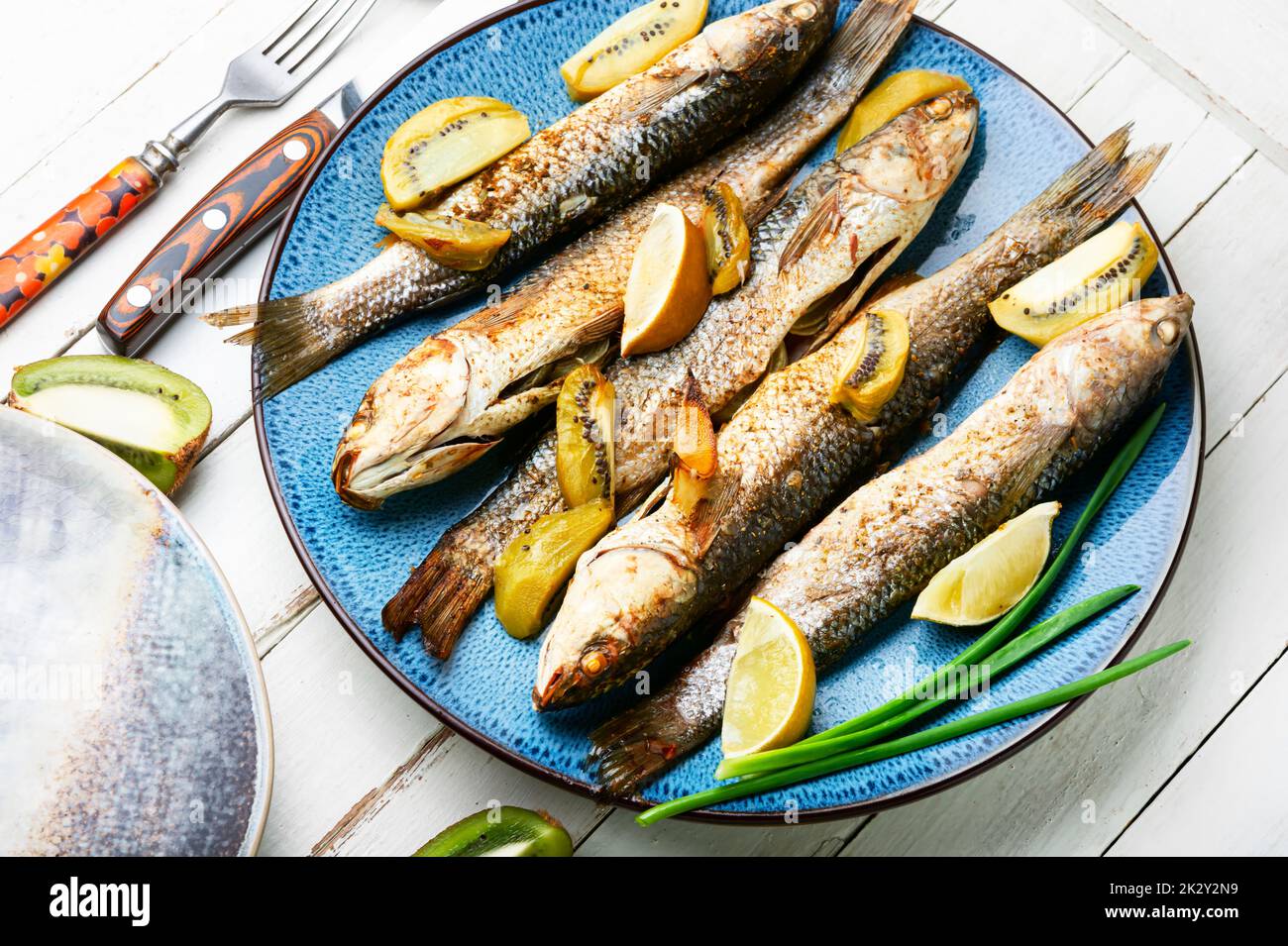 Roast fish pelengas, seafood Stock Photo - Alamy