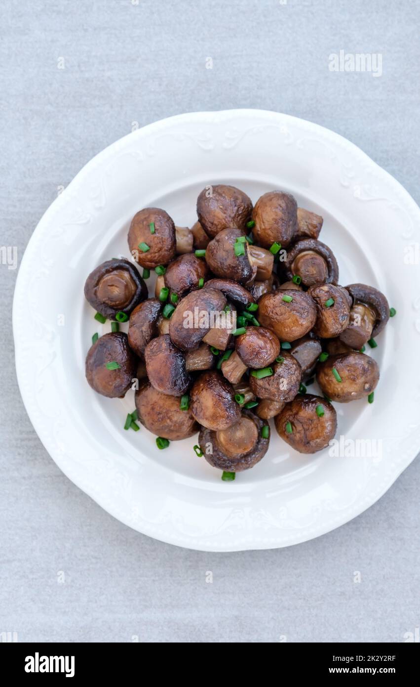 Stirfry button mushrooms Stock Photo Alamy