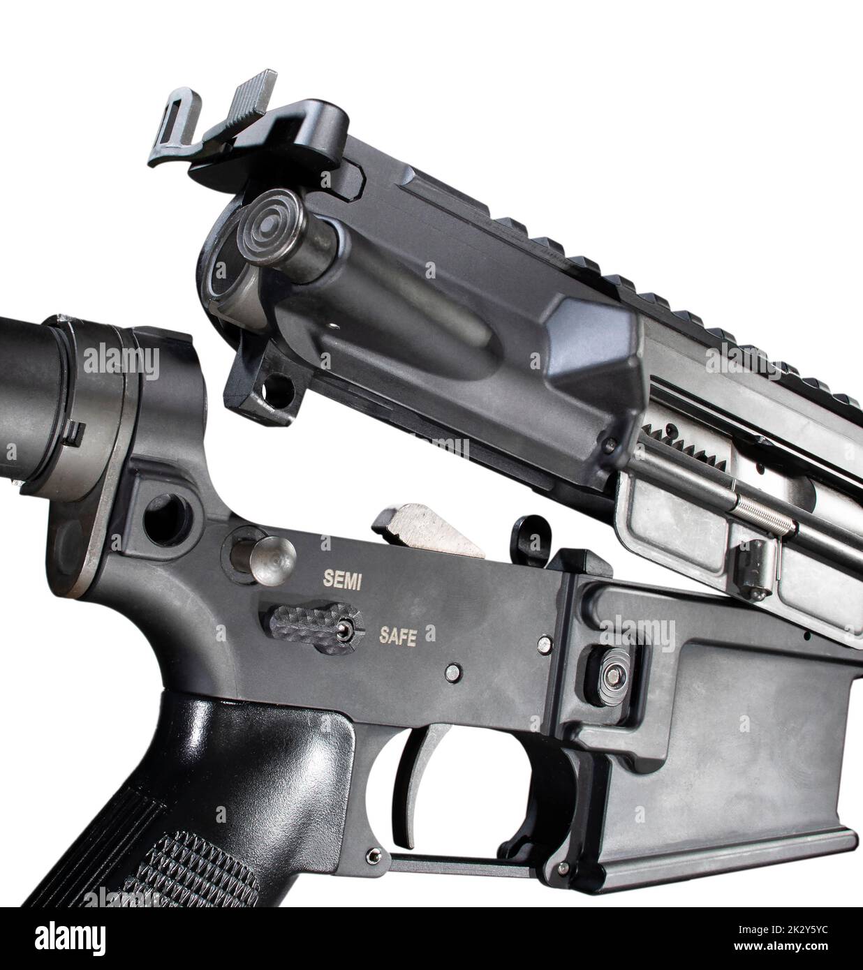 Upper and lower receiver separating in an assault rifle on white Stock Photo