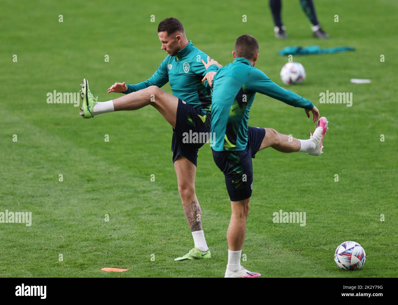 Soccer Football - UEFA Nations League - Republic of Ireland Training - Hampden Park, Glasgow, Scotland, Britain - September 23, 2022 Republic of Ireland's Alan Browne during training with teammate REUTERS/Russell Cheyne Stock Photo