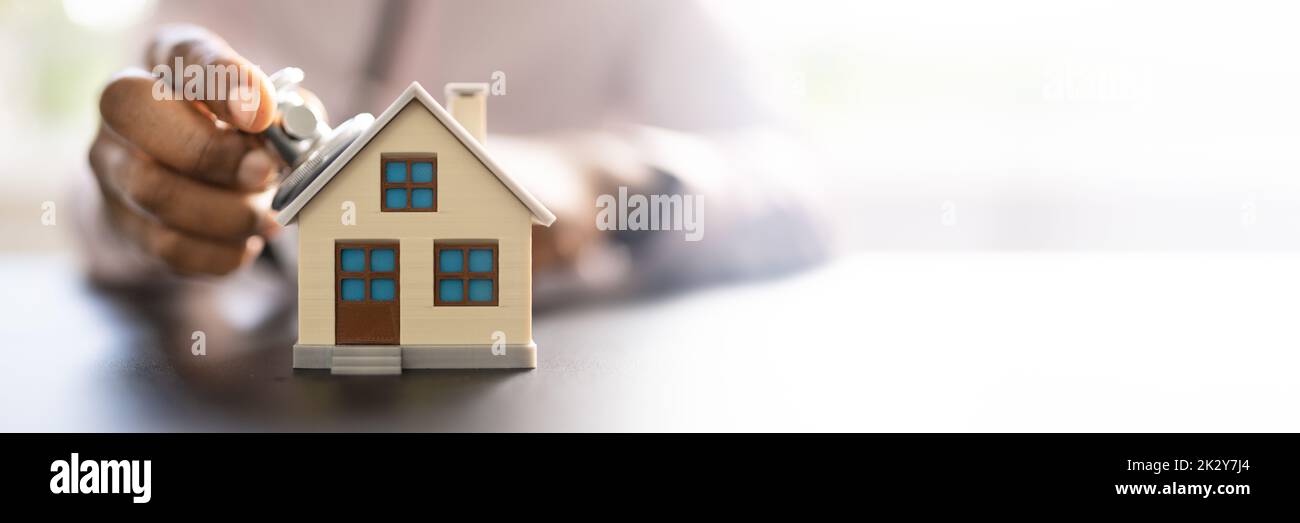 Doctor Doing Homecare Inspection. House Property Check Stock Photo