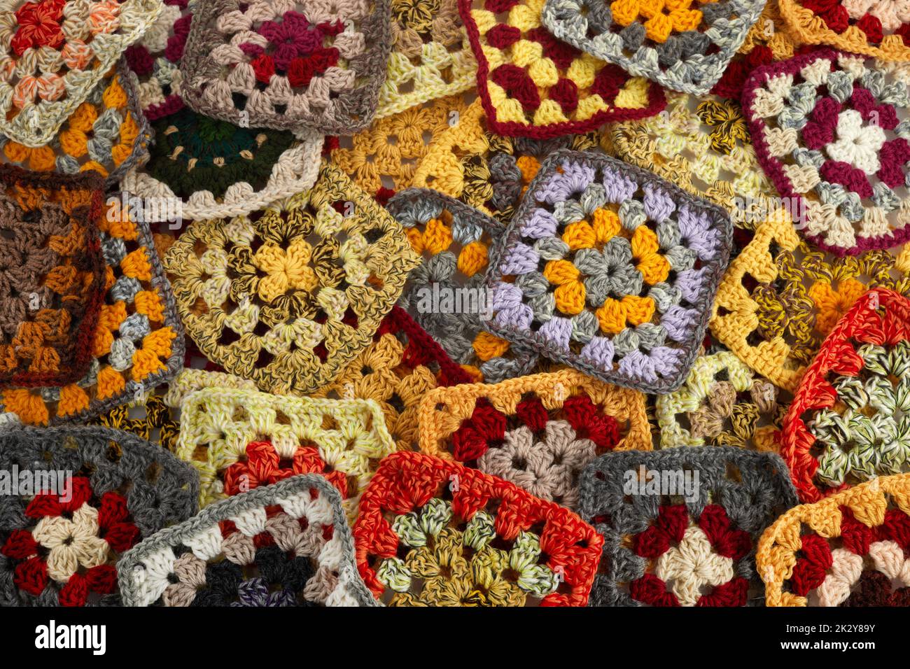 Granny squares. Colored wool knitting crocheting Stock Photo