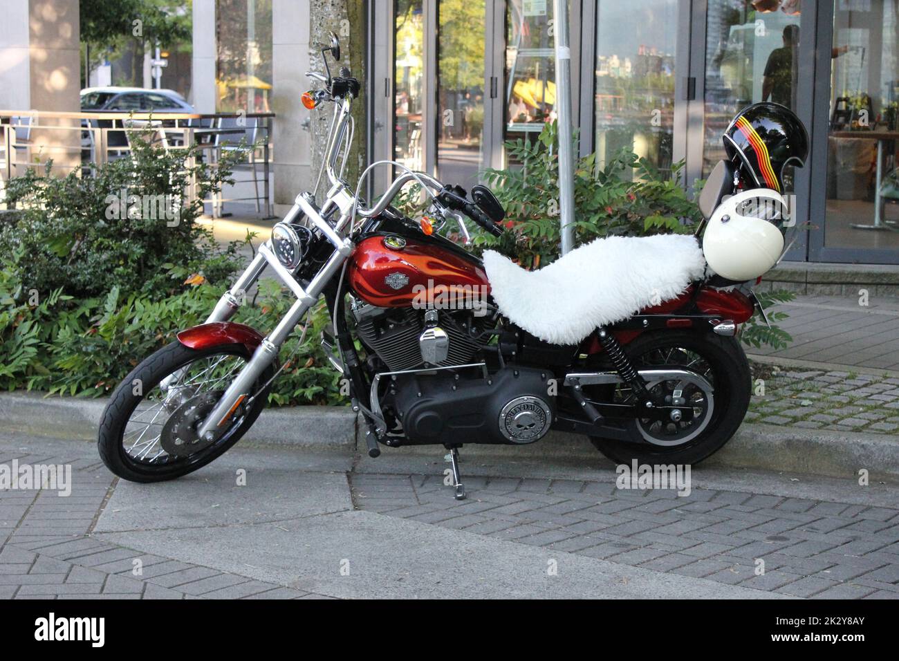 A Classic Harley Davidson motorcycle in downtown Vancouver, British Columbia, Canada Stock Photo