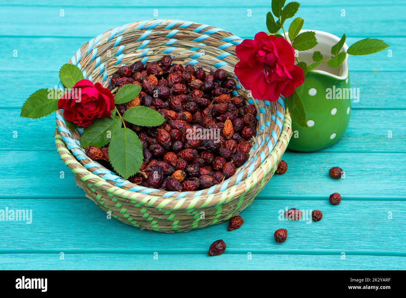 Many rose hips in a basket Stock Photo