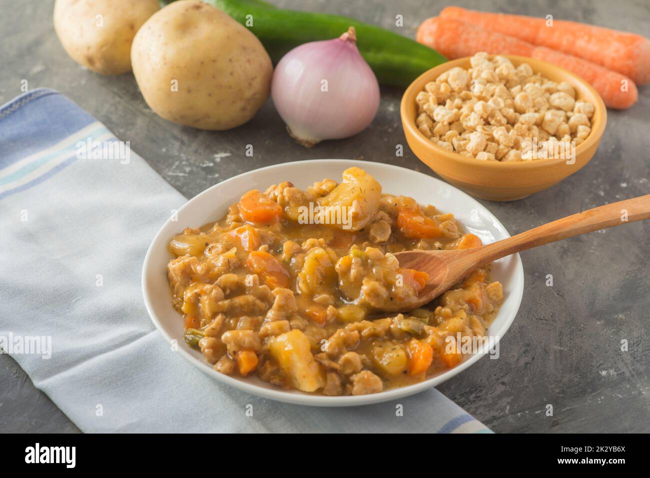 Soyabean and vegetables stew white plate Stock Photo Alamy
