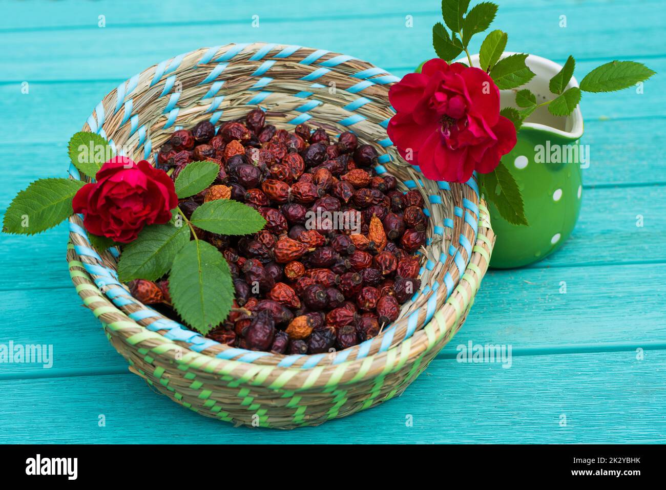 Many rose hips in a basket Stock Photo