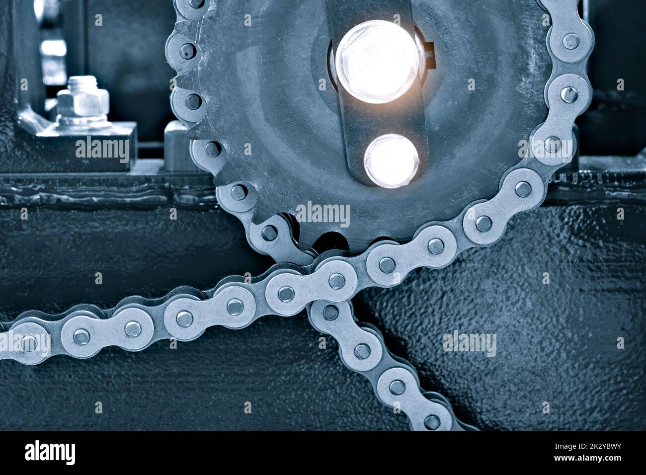 Gear chain drive shaft in conveyor belt is on production line. Timing