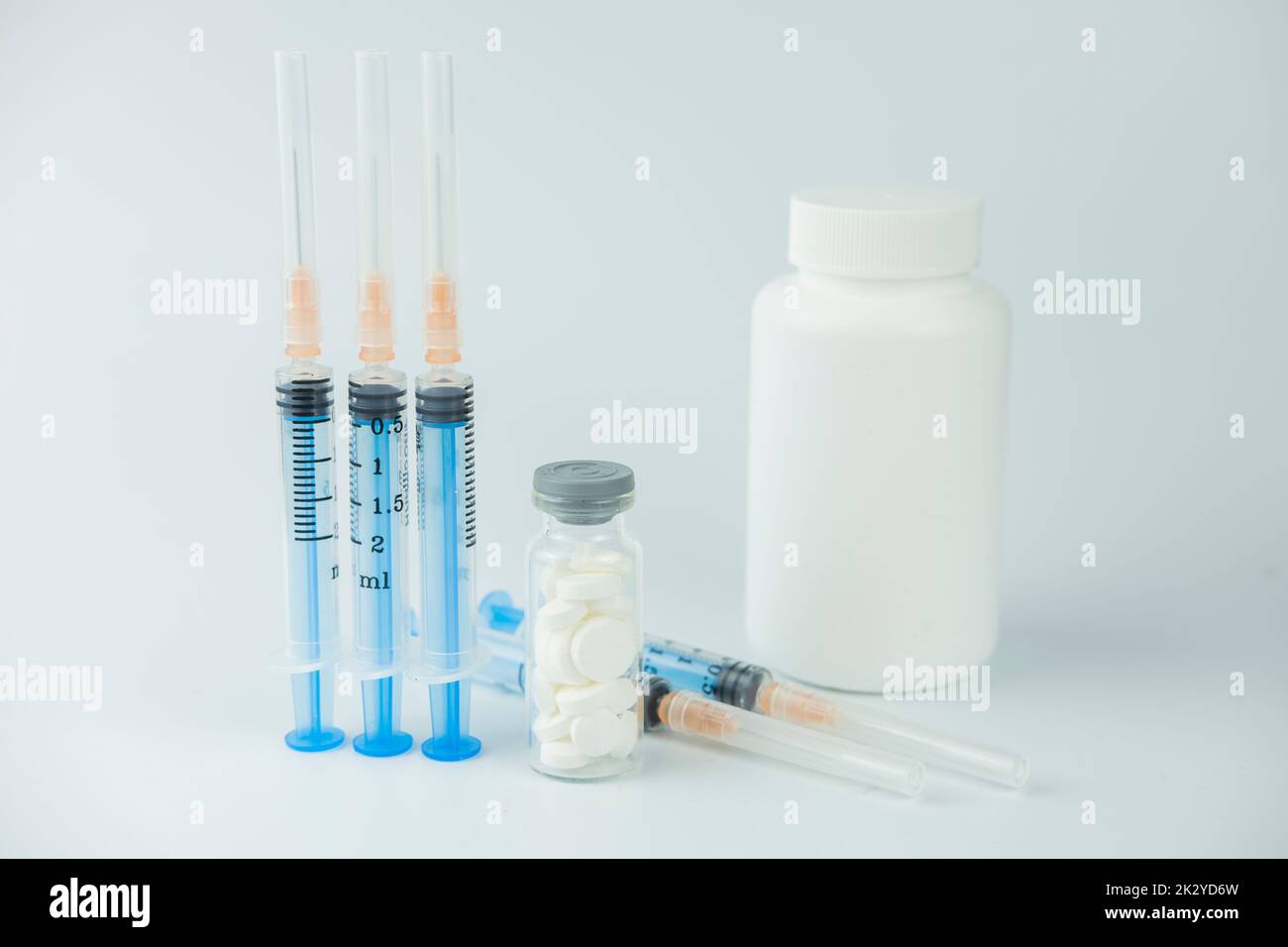 jar white packaging with medicines pills in medicine for treatment on a simple background Stock Photo