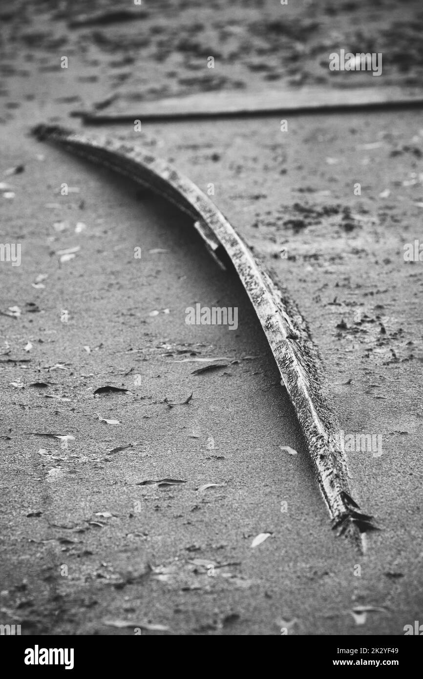 Old Wooden Abandoned Rowing Boat Flooded. Forgotten Things Concept. Hopelessness, Loss Of Normalcy. Boat Never Float Again. Depressive Mood Black Stock Photo