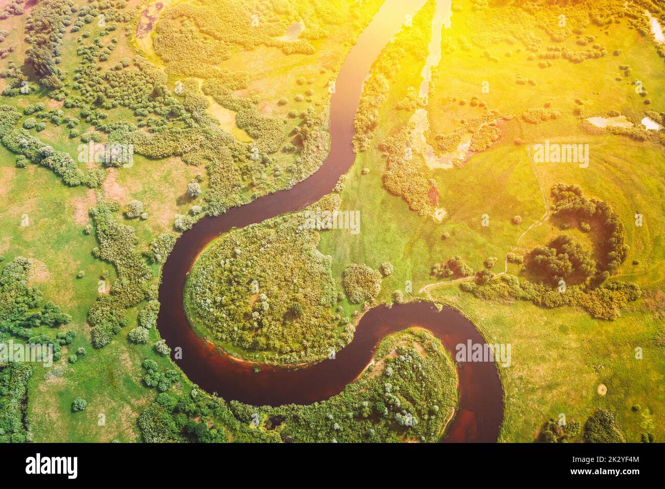 Aerial View Of Summer Curved River Landscape. Top View Of Beautiful European Nature From High Attitude. Drone Flight View. Bird's Eye View Of Green Stock Photo