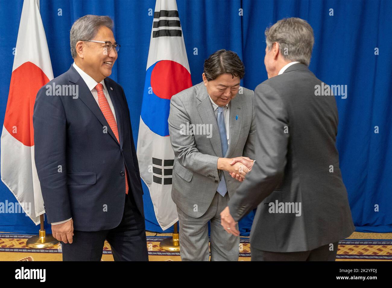 New York City, United States. 22nd Sep, 2022. U.S. Secretary of State Tony Blinken, left, shakes hands with Japanese Foreign Minister Hayashi Yoshimasa and Republic of Korea Foreign Minister Park Jin, left, before the start of their trilateral meeting on the sidelines of the 77th Session of the U.N General Assembly, September 22, 2022, in New York City. Credit: Ron Przysucha/State Department Photo/Alamy Live News Stock Photo