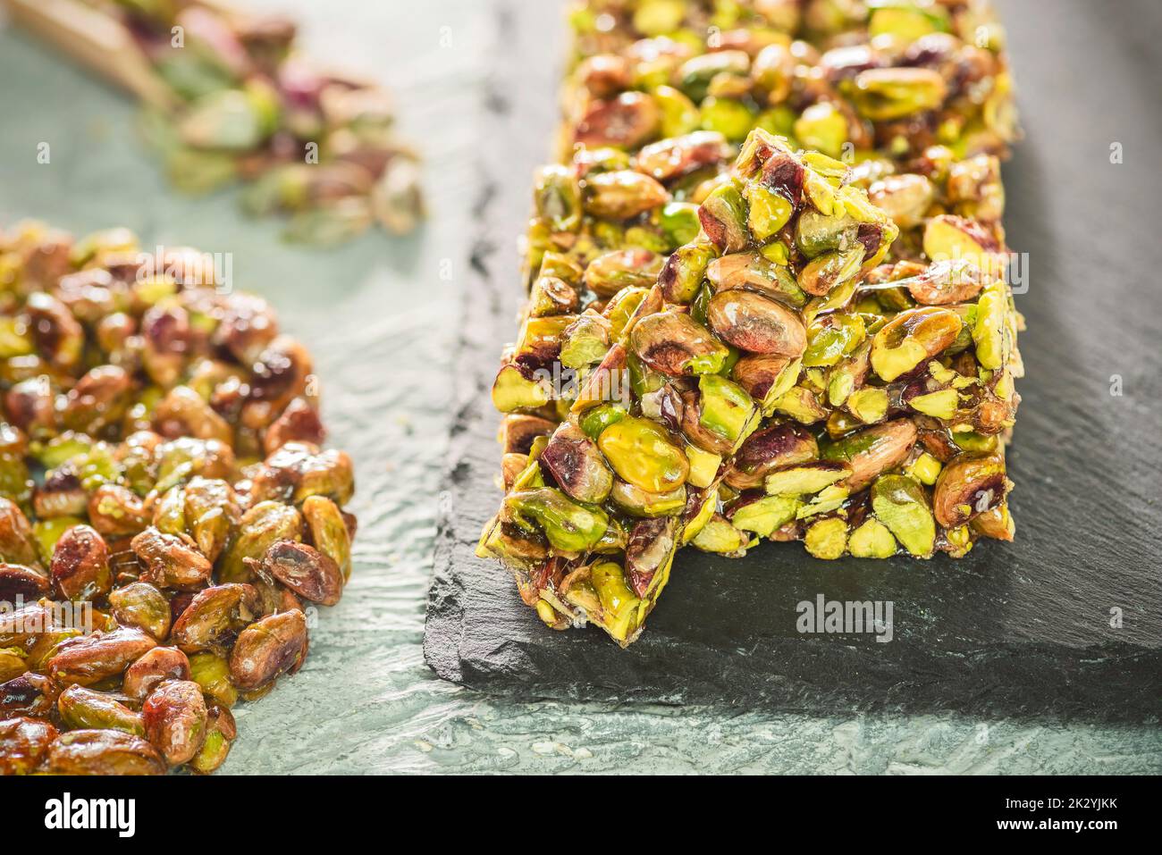 Arabic traditional sugar coated pistachio sweets. Egyptian oriental dessert usually eaten during 'Prophet Muhammad Birthday Celebration'. Stock Photo