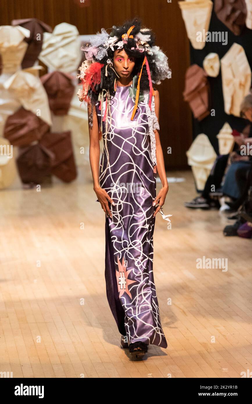 Model Nasiba Abdi, modelling on catwalk for VIN+OMI 'Opinions' show for London Fashion Week 2022. Recycled materials. Sustainable fashion. Stock Photo