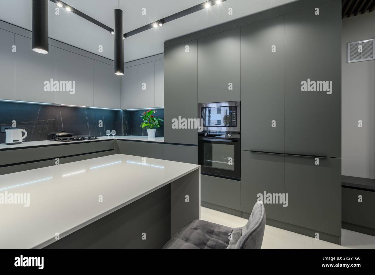 Picture of Luxury dining room and kitchen in studio apartment Stock Photo - Alamy