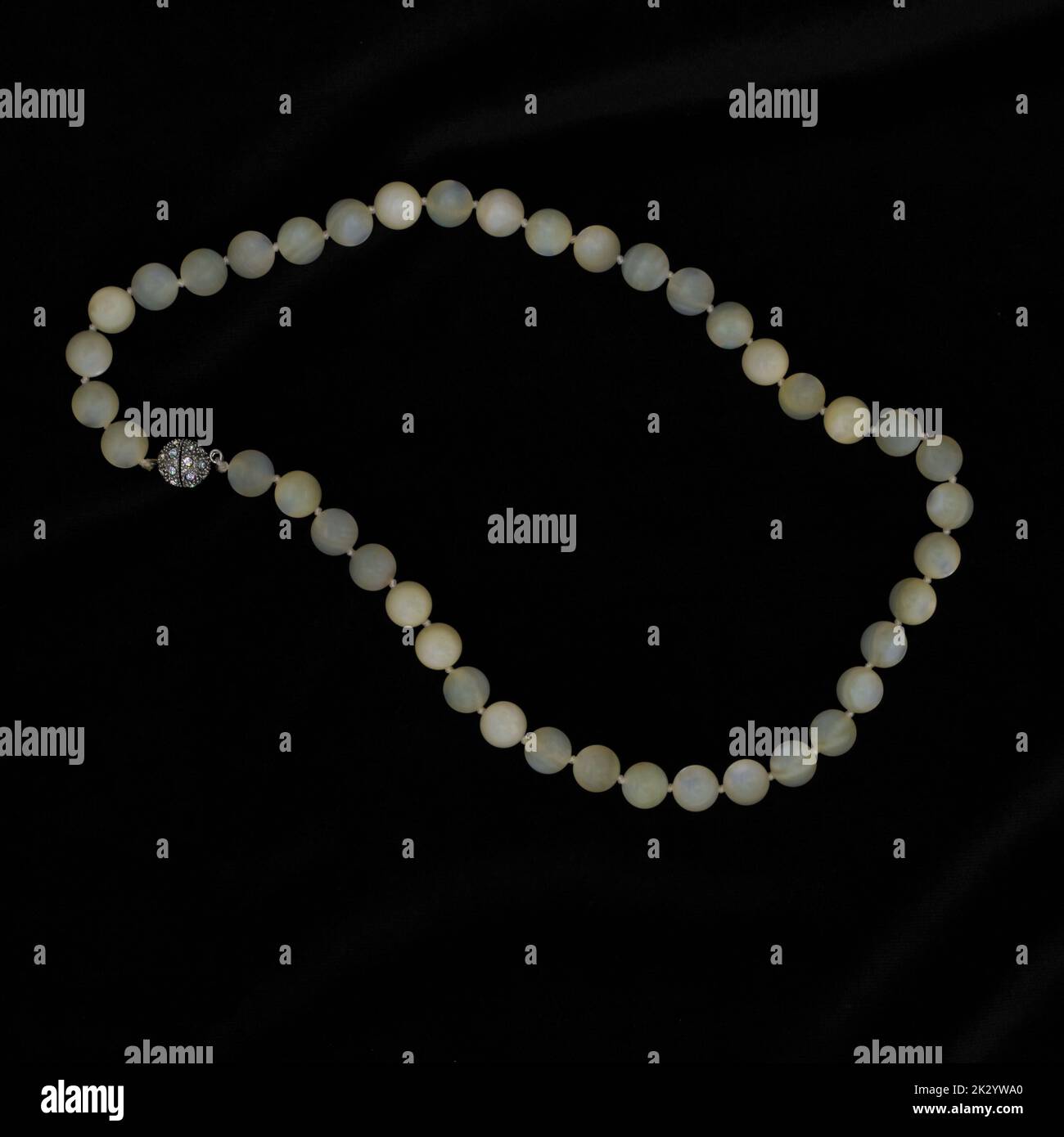 Ohrid lake Pearl necklace on black background from Macedonia Stock Photo