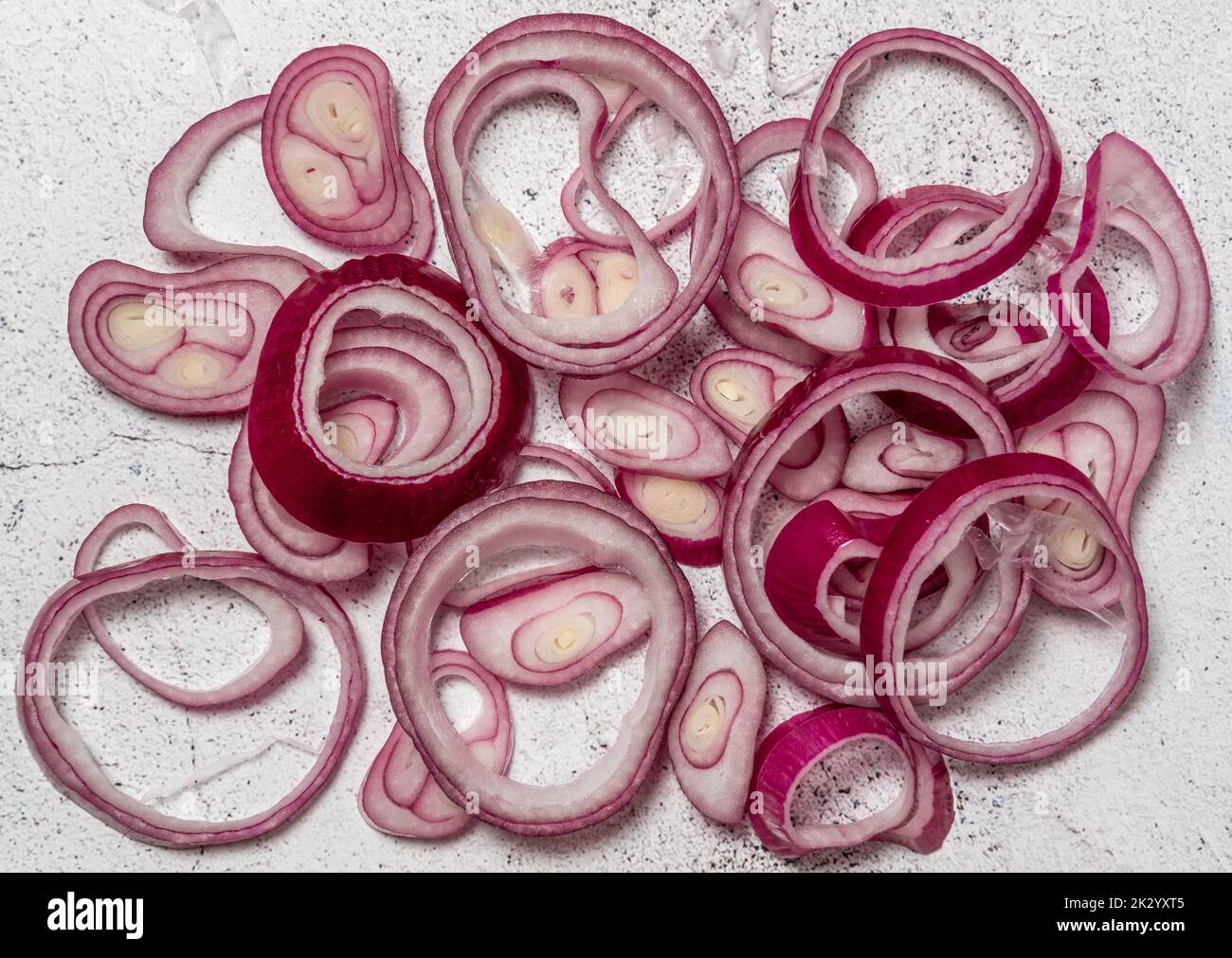 sliced red onion arrangement Stock Photo