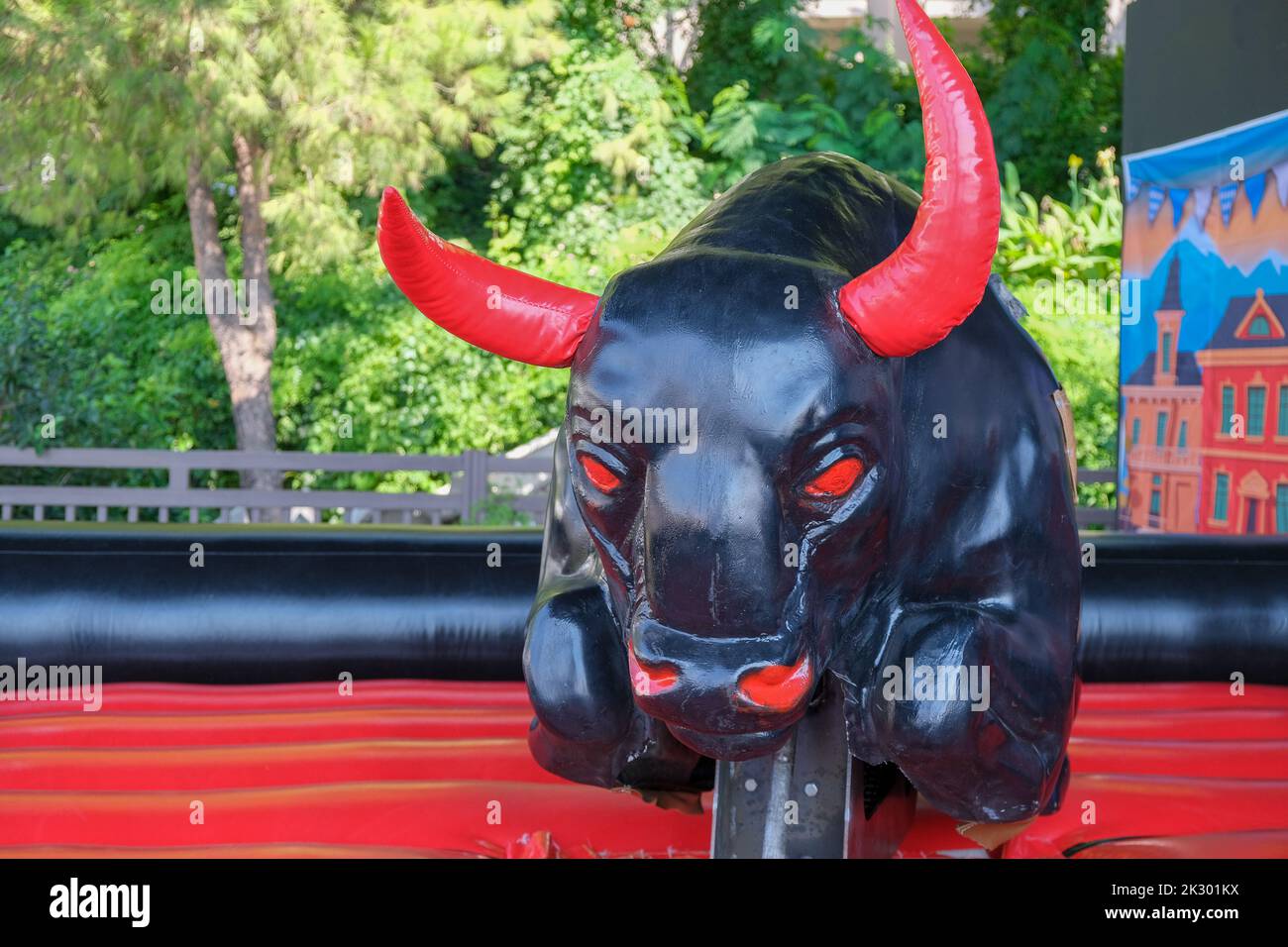 Electric bull ready for a party, jumping artificial electric buffalo, copy space. Stock Photo