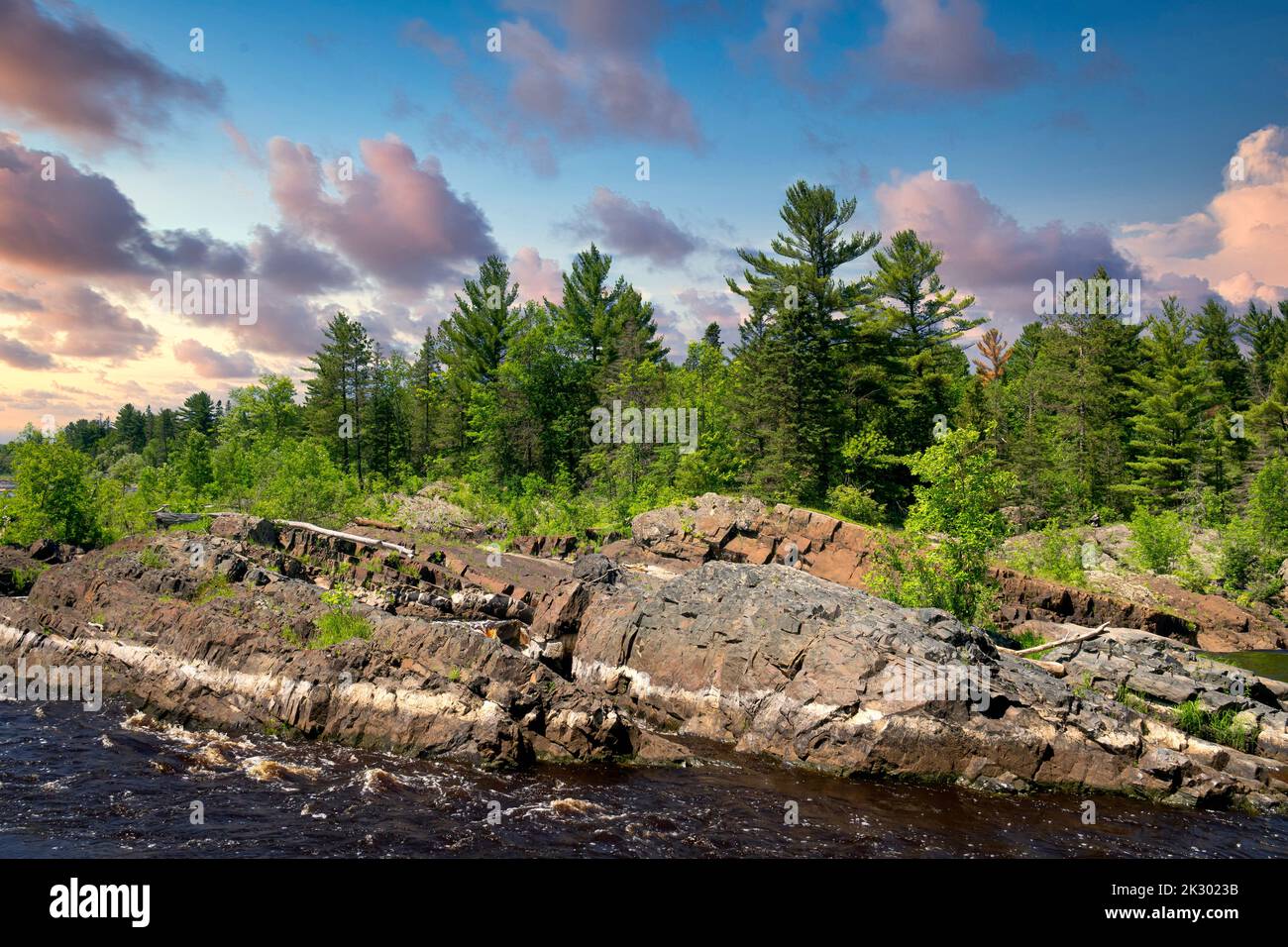 Flowing St. Louis River at dusk at Jay Cooke State Park, Minnesota. Stock Photo