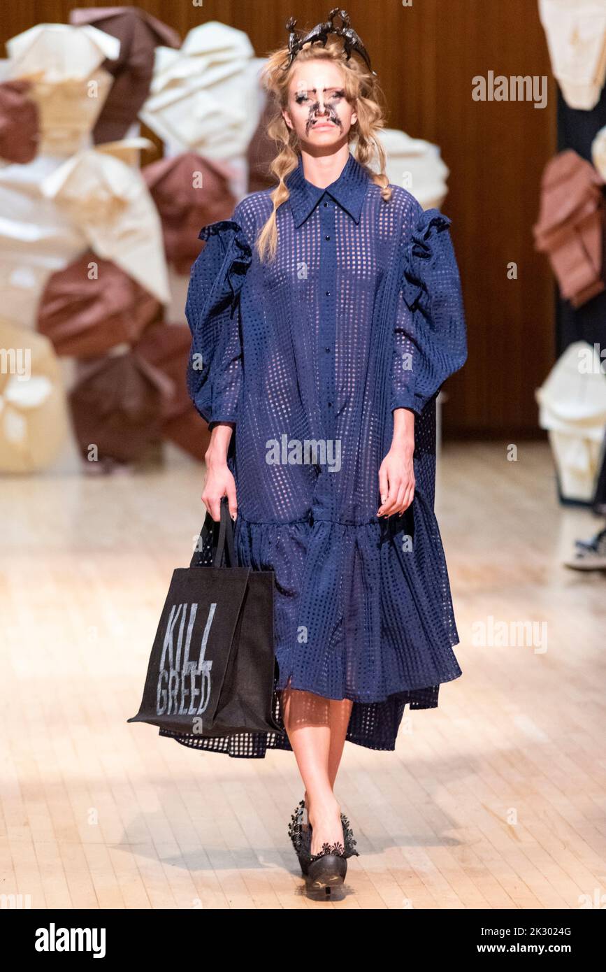 Model INDRE NOVIKAITE, modelling on catwalk for VIN+OMI 'Opinions' show for London Fashion Week 2022. Recycled materials. Sustainable fashion. Stock Photo
