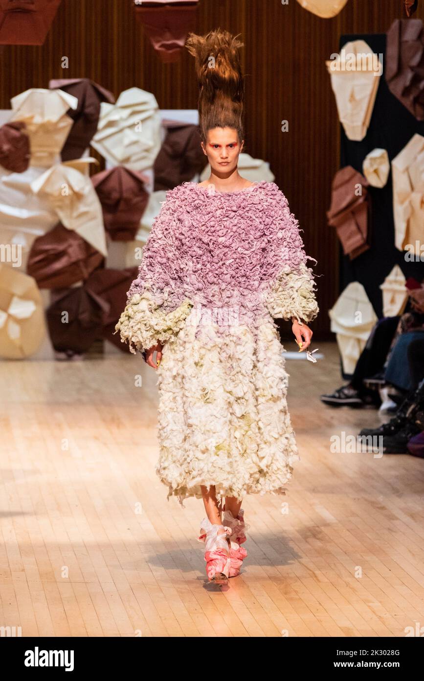 Model, modelling on catwalk for VIN+OMI 'Opinions' show for London Fashion Week 2022. Recycled materials. Sustainable fashion. Nettles and plants spun Stock Photo