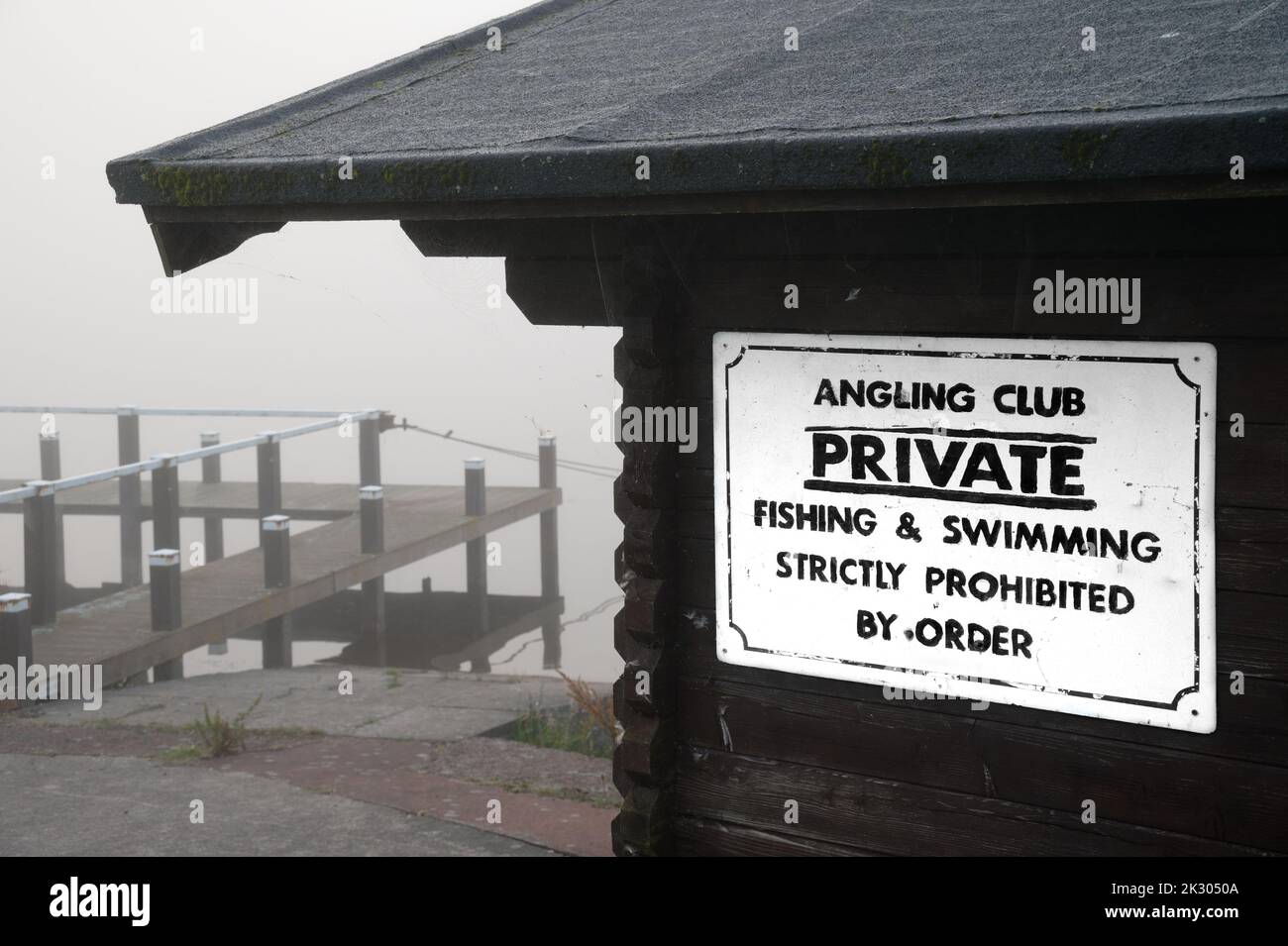 Private fishing and swimming sign at lake in Kilmacolm Stock Photo