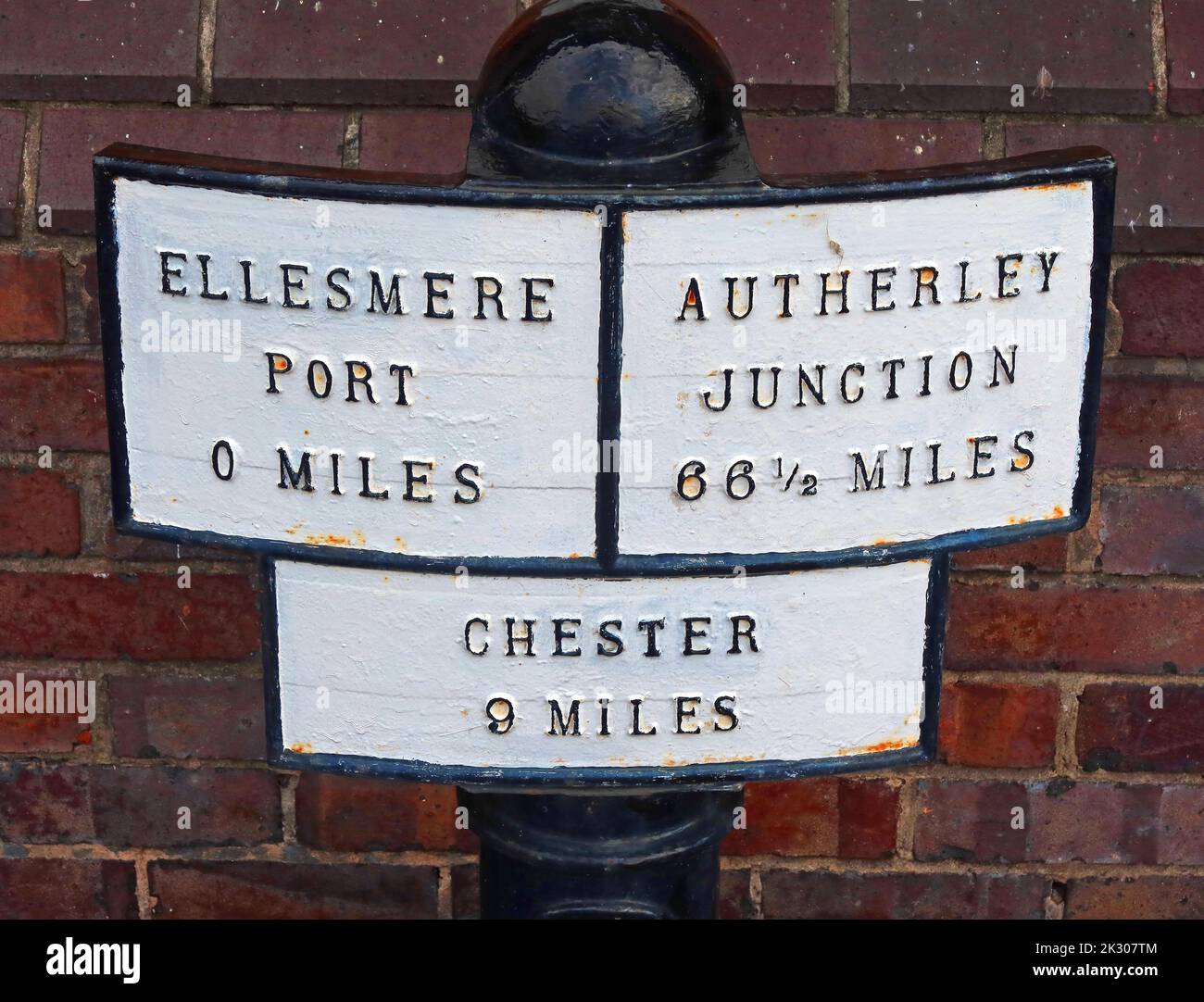 Canal distance marker, sign at Ellesmere Port, to Autherley Junction and Chester Stock Photo