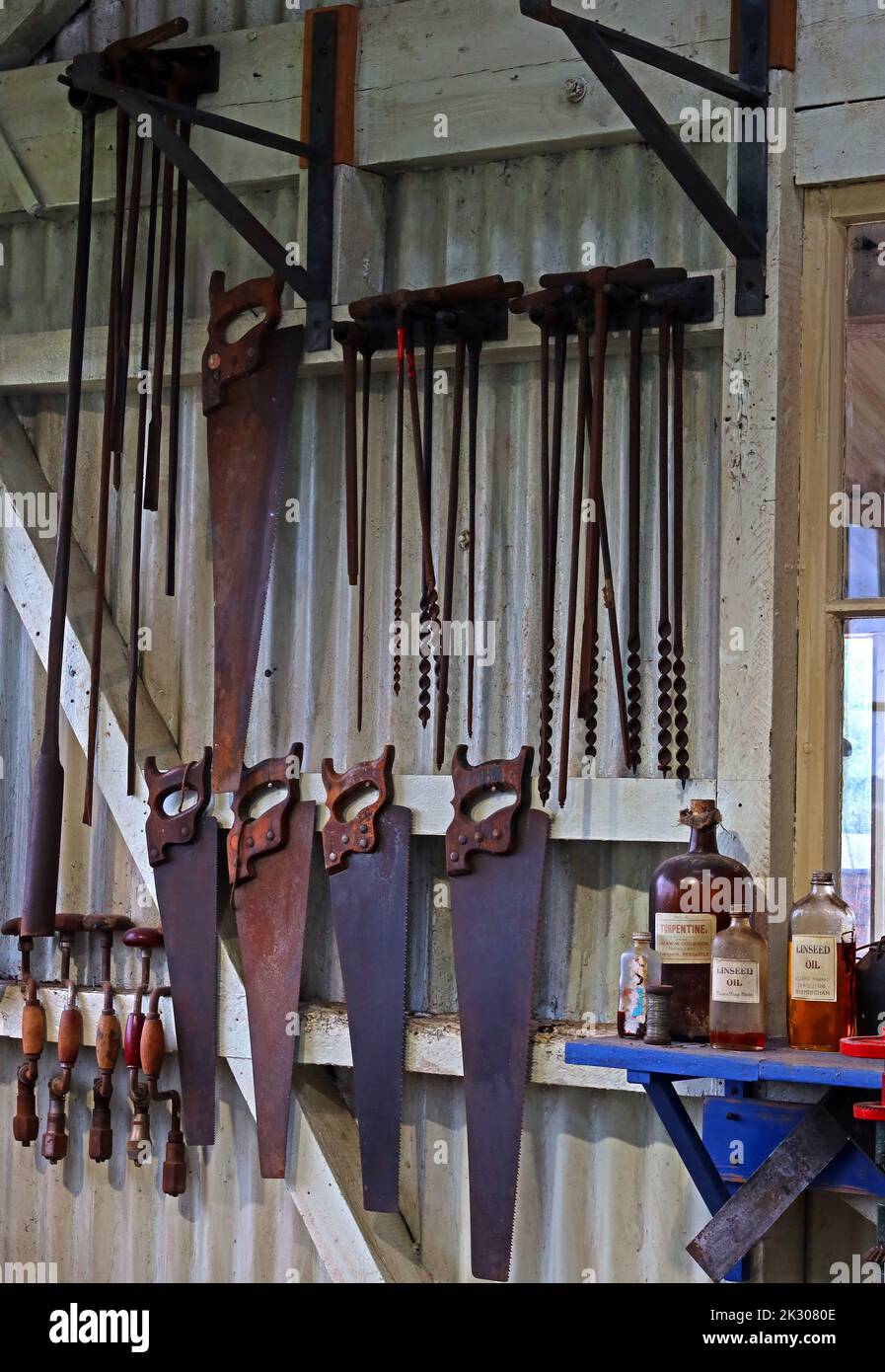 Tools stored in a toolshed neatly, saws, Stock Photo