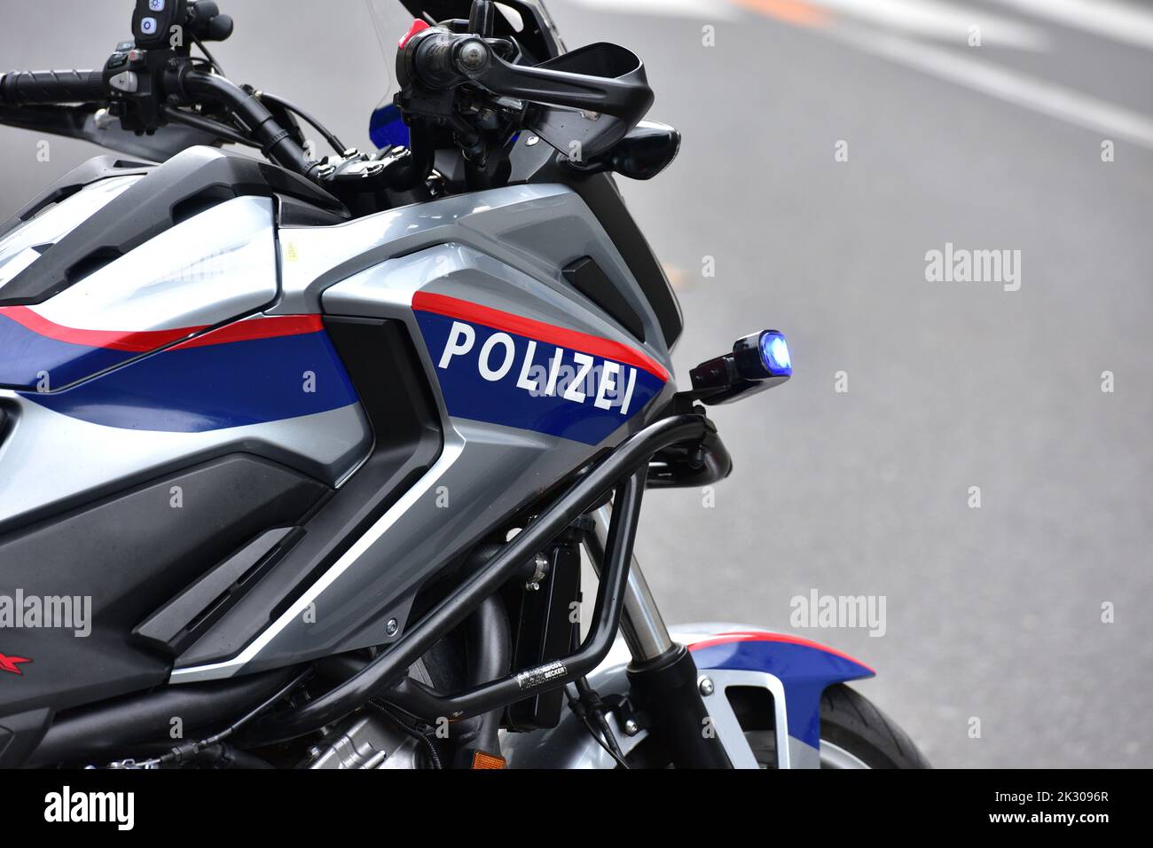 Police motorcycle in action in Linz, Austria Stock Photo