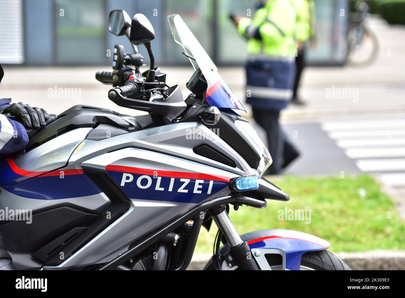 Police motorcycle in action in Linz, Austria Stock Photo